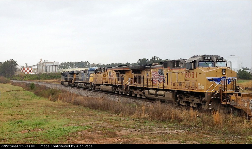 CSX 956 and 245 teamed up with UP 7643 and 6031